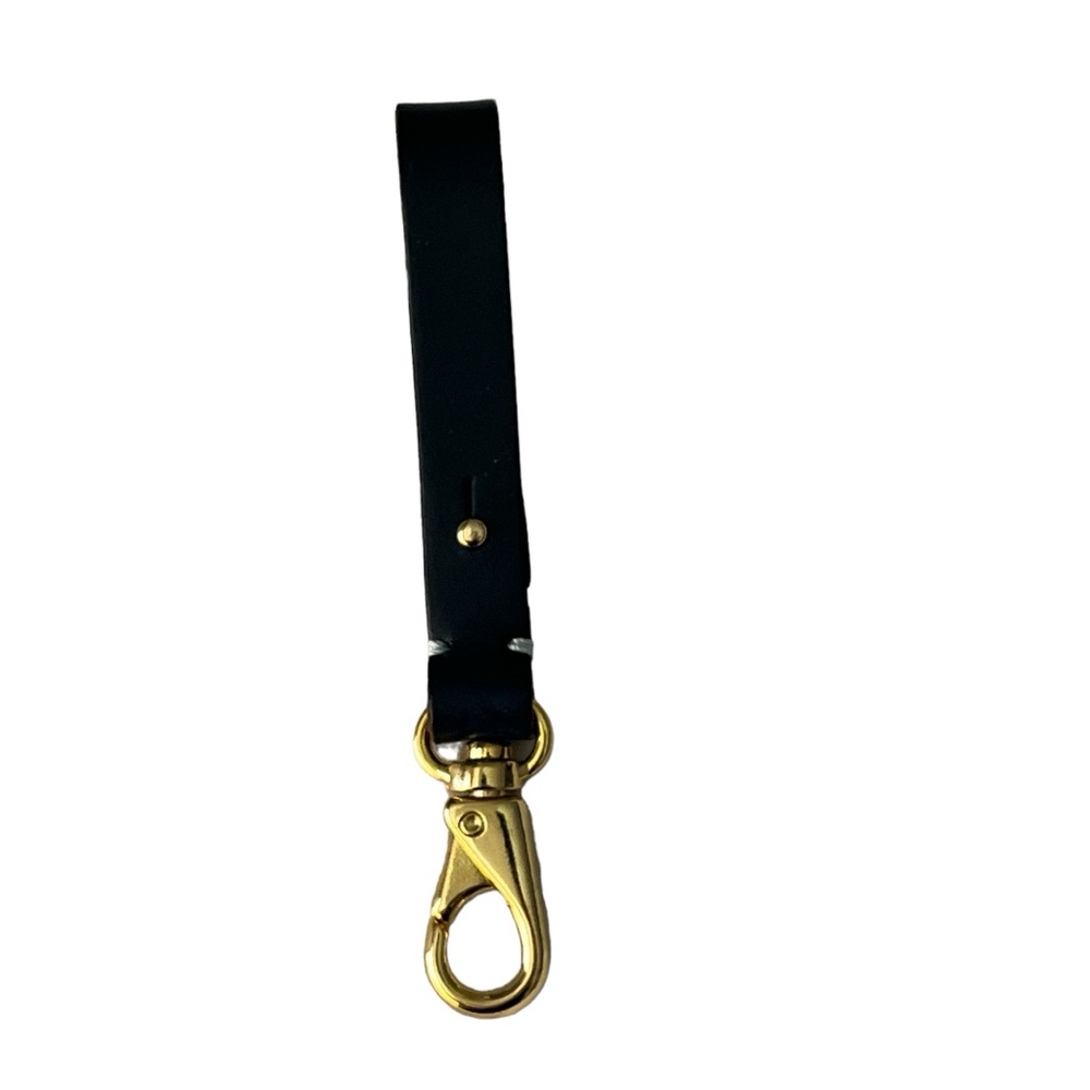 Blue leather and gold tone key fob